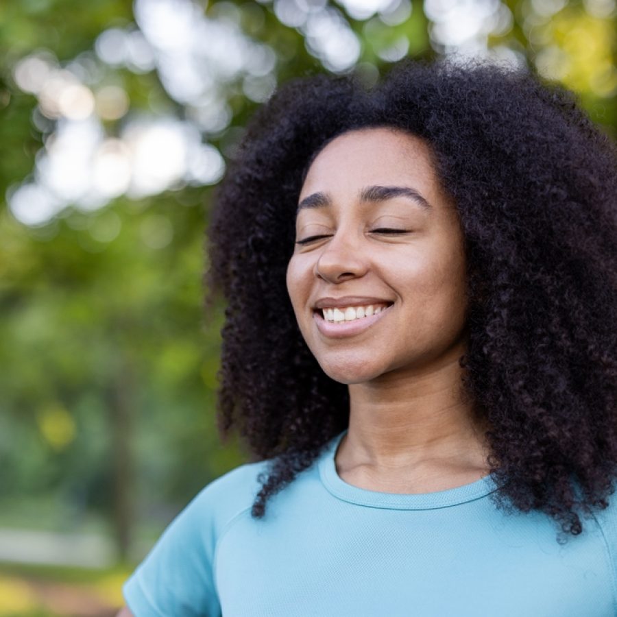 Smiling,African,American,Female,Athlete,Partakes,In,An,Outdoor,Fitness Smiling,African,American,Female,Athlete,Partakes,In,An,Outdoor,Fitness